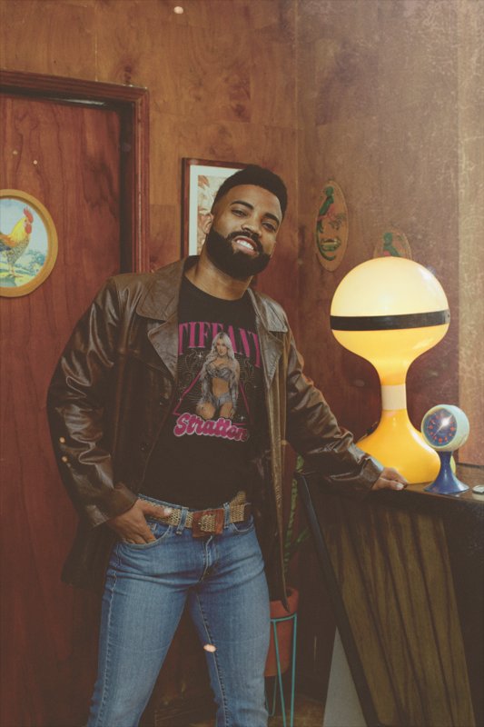 Load image into Gallery viewer, Tiffany Stratton Purple Pose Black T-shirt by EWS | Extreme Wrestling Shirts